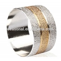 Metal round textured silver and gold napkin ring